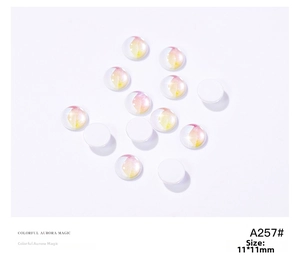 Close-up of 11mm aurora colorful round resin nail art rhinestones with magic pearl shine