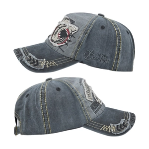 Detailed side view of washed cotton shark embroidery and vintage style distressing on the cap