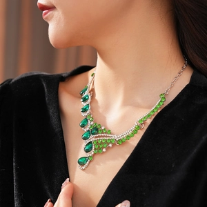 Exquisite vintage water drop necklace with emerald green gems and sparkling clear rhinestones