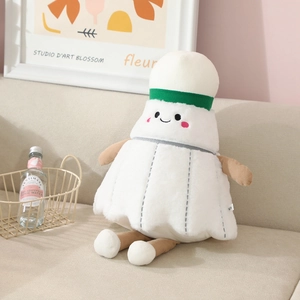 Creative shuttlecock plush toy on a sofa, cozy badminton doll with corduroy limbs