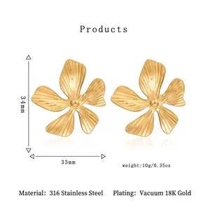 Golden stainless steel flower earrings with textured petals measuring 33mm by 34mm