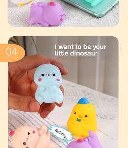 Macro shot of colorful squishy cartoon animal toys including dinosaurs and chicks