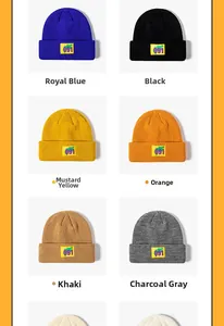 Detail view of knitted beanie hats in six colors with numerical 091 rectangular patches