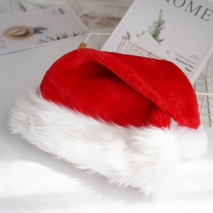 Classic red plush Christmas hat with white fur trim displayed on a clean white surface