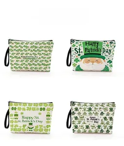 Set of four St. Patrick's Day clover canvas makeup bags with zippers and wrist straps