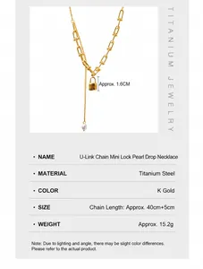Detailed close-up of U-shaped chain with engraved LOVE lock pendant and pearl tassel