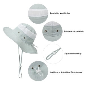 Breathable mint green kids sun hat with wide brim mesh panel and adjustable chin strap