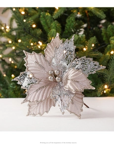 Champagne gold artificial Christmas flower with glitter and festive leaf details