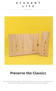 Detail view of solid wood necklace display stand with natural wood grain texture