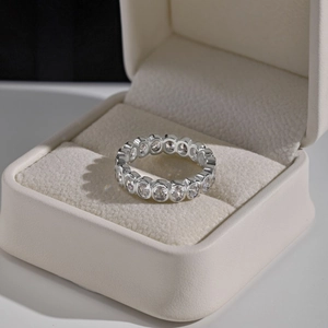 Macro view of S925 silver eternity ring with zircon stones in a jewelry box