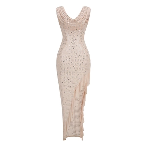 Detail of pink slim-fit dress with silver rhinestones and ruffled irregular hemline
