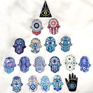 Mix of colorful acrylic Evil Eye and Hamsa Hand charms for DIY jewelry and necklaces