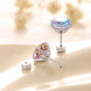 Dual-color gradient zircon titanium steel screw back earrings on floral background