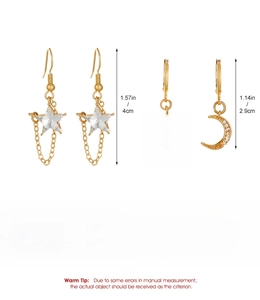 Detail view of vintage alloy star and moon earrings with dimensions 4cm and 2.9cm