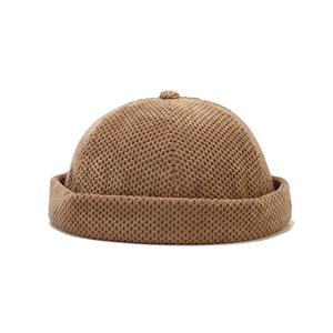 Brown retro knit brimless dockers cap with textured pattern and rolled edge