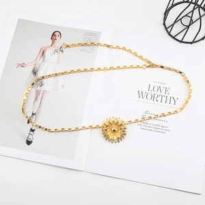 Detail of gold sunflower waist chain with square links and adjustable lobster clasp