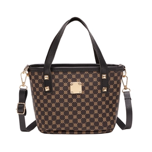 Mini floral bucket handbag in dark brown faux leather with adjustable black shoulder strap
