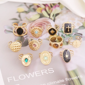 Set of 11 gold stainless steel rings with vintage natural stones and starburst motifs