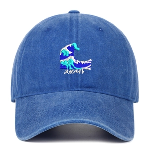 Close-up of vintage blue washed denim baseball cap with ocean wave embroidery and Japanese text