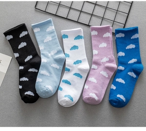 Cute cloud pattern crew socks for women and men, casual cotton skateboard socks in multi colors.