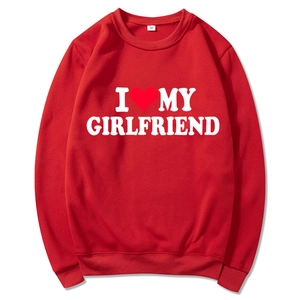 Red crewneck sweatshirt featuring a white I Love My Girlfriend print and heart graphic