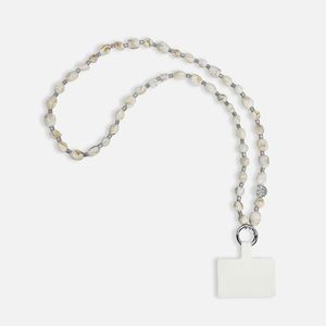 Detail of bohemian marble beads phone strap with silver spacers and metal spring clasp