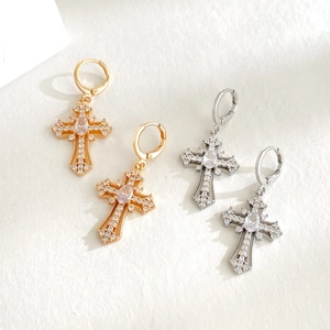 Vintage gold and silver cross earrings with pavé cubic zirconia and oval center stone