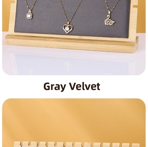 Bamboo necklace display stand with grey velvet backboard and multiple jewelry slots