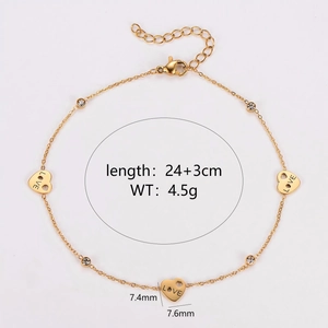 Gold-plated O-chain anklet featuring LOVE engraved hearts and sparkling round crystals