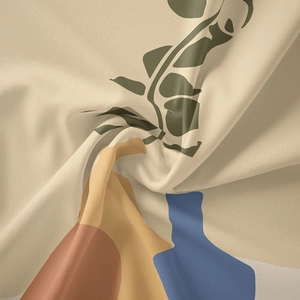 Vue détaillée de la texture du tissu bohème et de l'imprimé végétal abstrait de la tenture