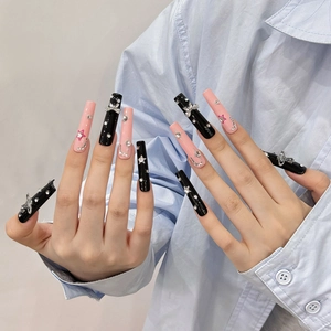 Handmade long coffin press-on nails with black pink gradient, 3D bows, and star rhinestones