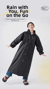 Detail of a black reusable thickened EVA hooded raincoat with white snap button closures