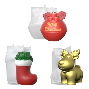 Christmas silicone molds for DIY resin crafts featuring reindeer, socks, and bells