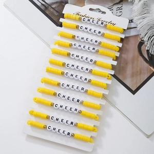 Set of 12 yellow clay bead friendship bracelets with CHEER letter beads and gold spacers