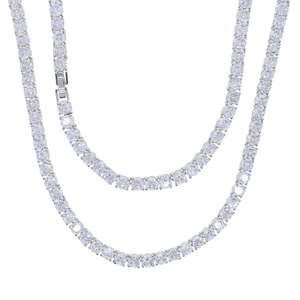 Detailed close-up of 5mm silver tennis chain with round-cut cubic zirconia and fold-over clasp
