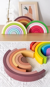 Detail of multi-layered semi-circular wooden rainbow stacking blocks for kids