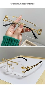 Detail of rimless rectangle sunglasses with gold cheetah hinge and transparent lenses