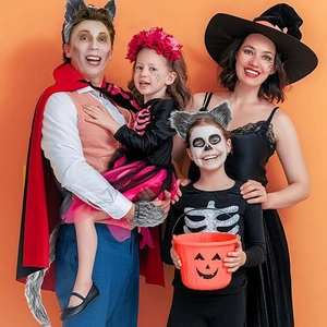 Family wearing leopard cat ears and tail costume accessories for Halloween party