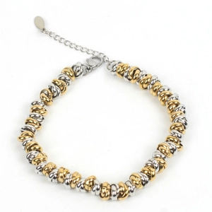 Two-tone titanium steel chain bracelet with gold and silver links and lobster clasp