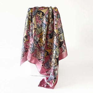 Detailed view of 90cm square satin silk scarf with artistic pink abstract cat patterns