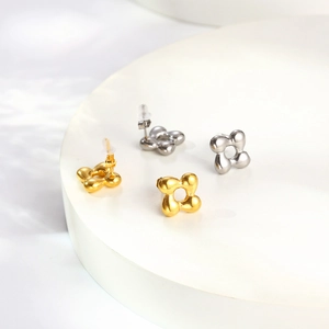 Minimalist geometric C-shape stainless steel stud earrings in gold and silver finish