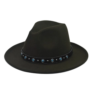 Detailed texture of dark green felt fedora with turquoise and silver metal accents