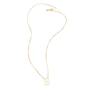 Minimalist gold necklace featuring a white enamel rectangular lightning bolt pendant