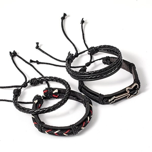 Detail of multi-layer hip-hop braided leather bracelets with silver guitar charm