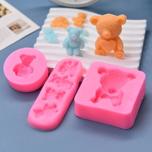 Pink silicone teddy bear molds for chocolate cake decor with colorful finished bears