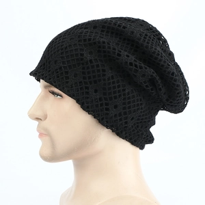 Detail of breathable black mesh crochet knit beanie showing diamond hollow pattern