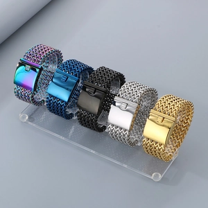 Five assorted colors of wide stainless steel mesh bracelets displayed on a clear rack