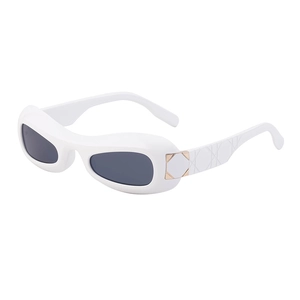 White oval sunglasses with grey lenses and quilted metal temples in a 45-degree view