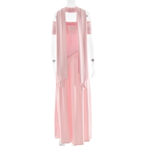 Detail view of pink strapless evening dress with elegant matching sash and draped skirt