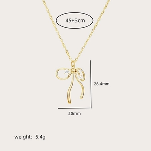 Golden bowknot necklace with zircon inlay pendant measuring 26.4mm by 20mm and 45cm chain